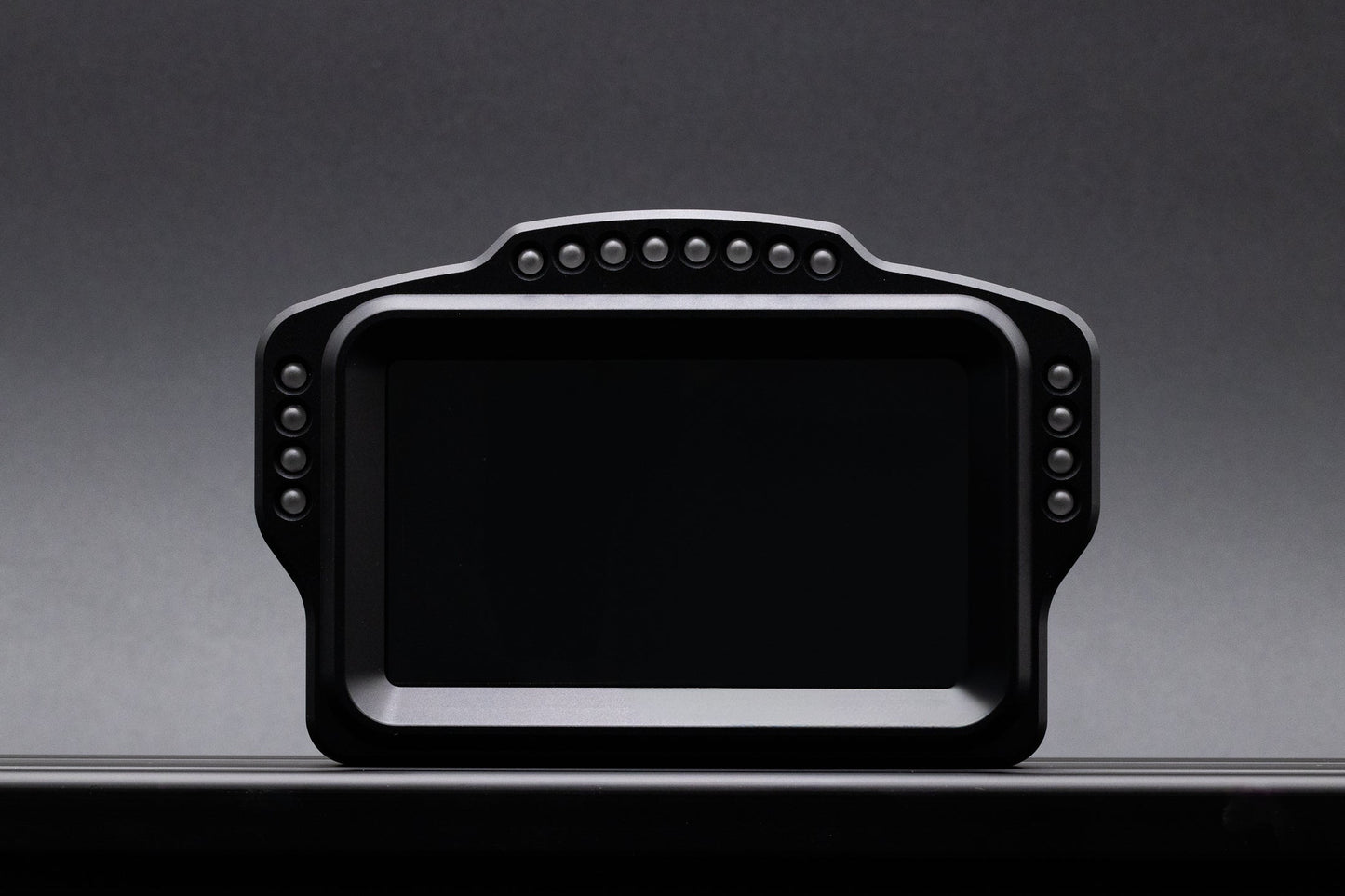 Black electronic device on a gray background