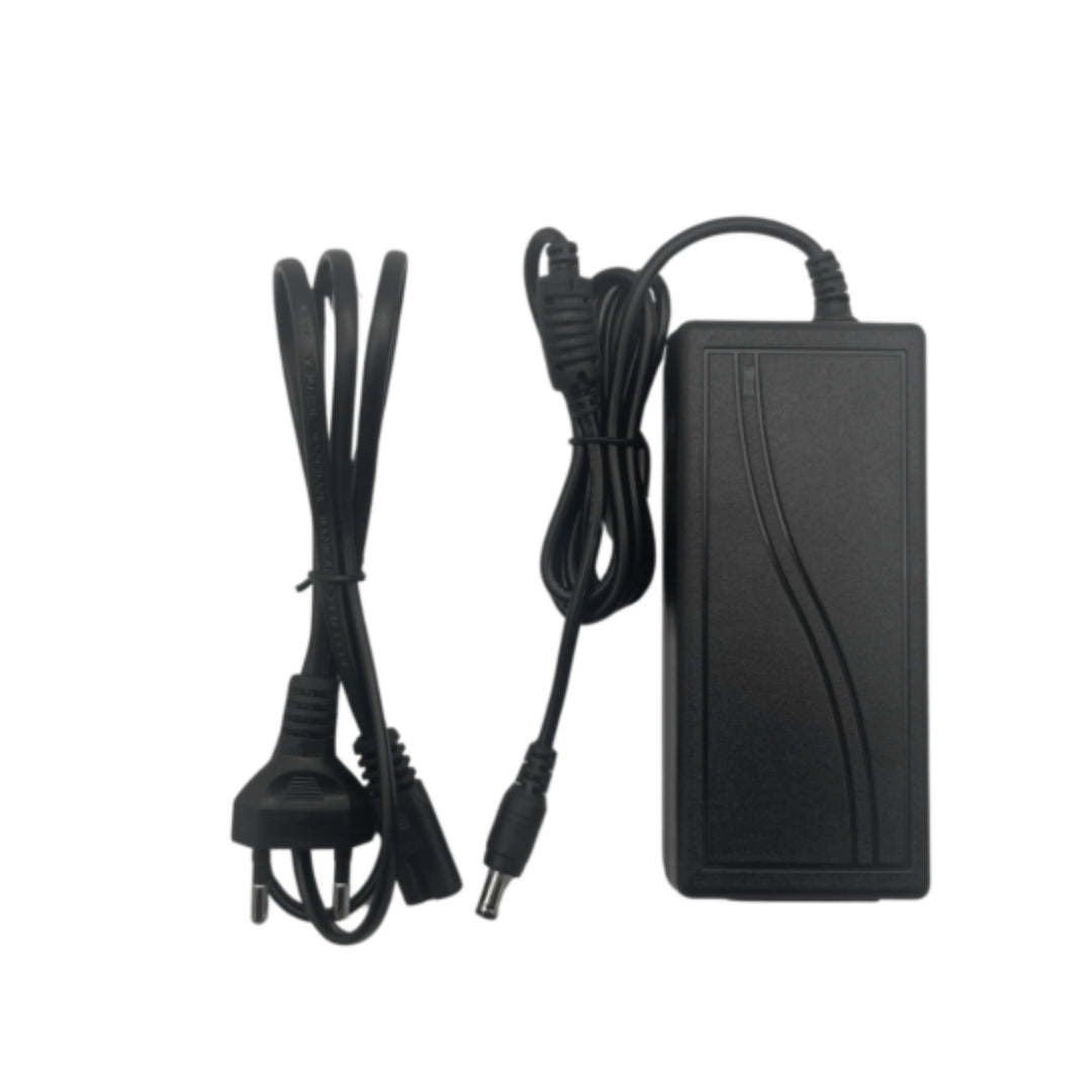 Black power adapter with cables on a white background