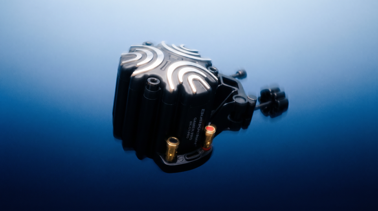 ButtKicker sim racing haptic feedback system designed for immersive tactile racing effects