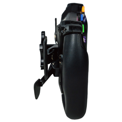 Close-up of a black scooter wheel with visible suspension and tire on a white background