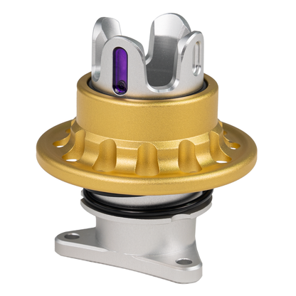 Metallic mechanical component with gold, silver, and purple colors on a white background