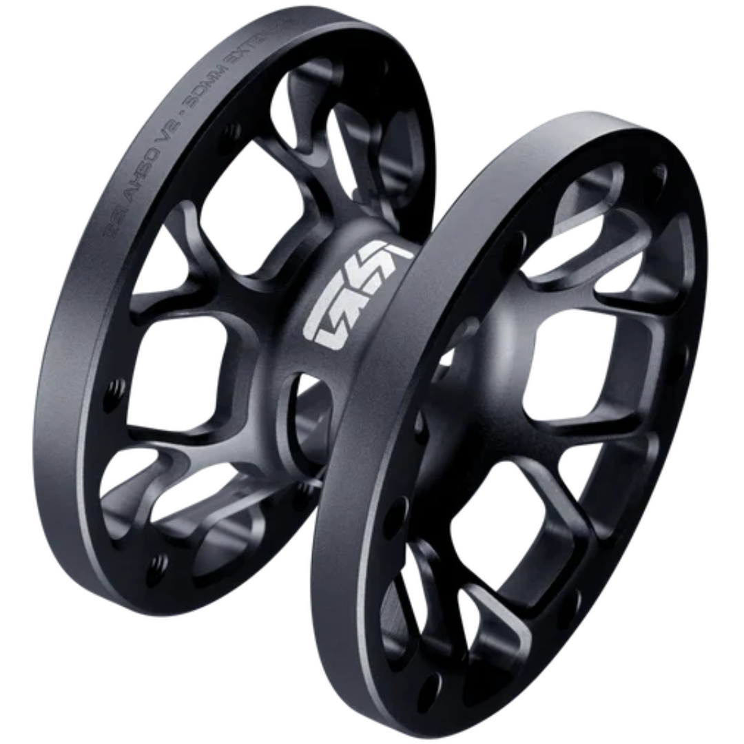 Two black metal sprockets on a white background