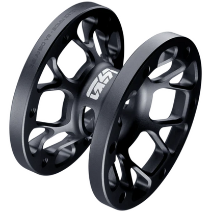 Two black metal sprockets on a white background
