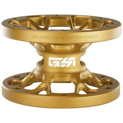 Gold metal component with 'GFX' branding on a white background