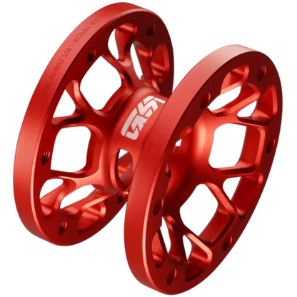 Two red metal sprockets on a white background