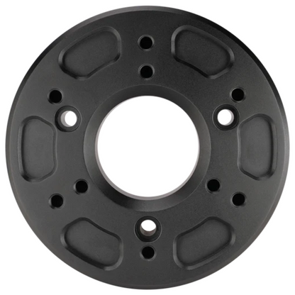 Black circular mechanical component on a white background