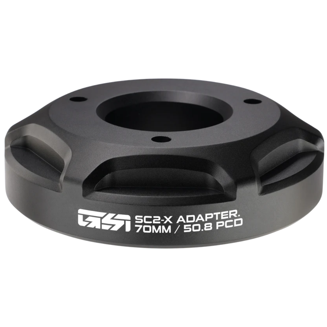 Black adapter with 'SC2-X' branding on a white background