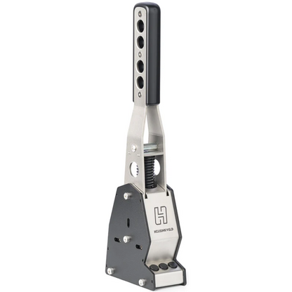 A large, GT-style sequential shifter with a magnetic shift system, featuring a compact base-unit and three buttons. The device is primarily silver and black in color.