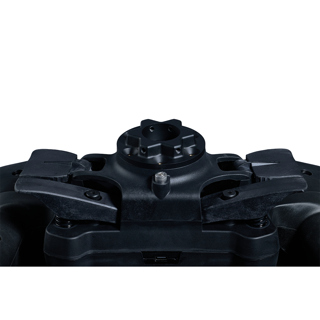 Close-up of a black mechanical component on a white background