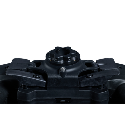 Close-up of a black mechanical component on a white background