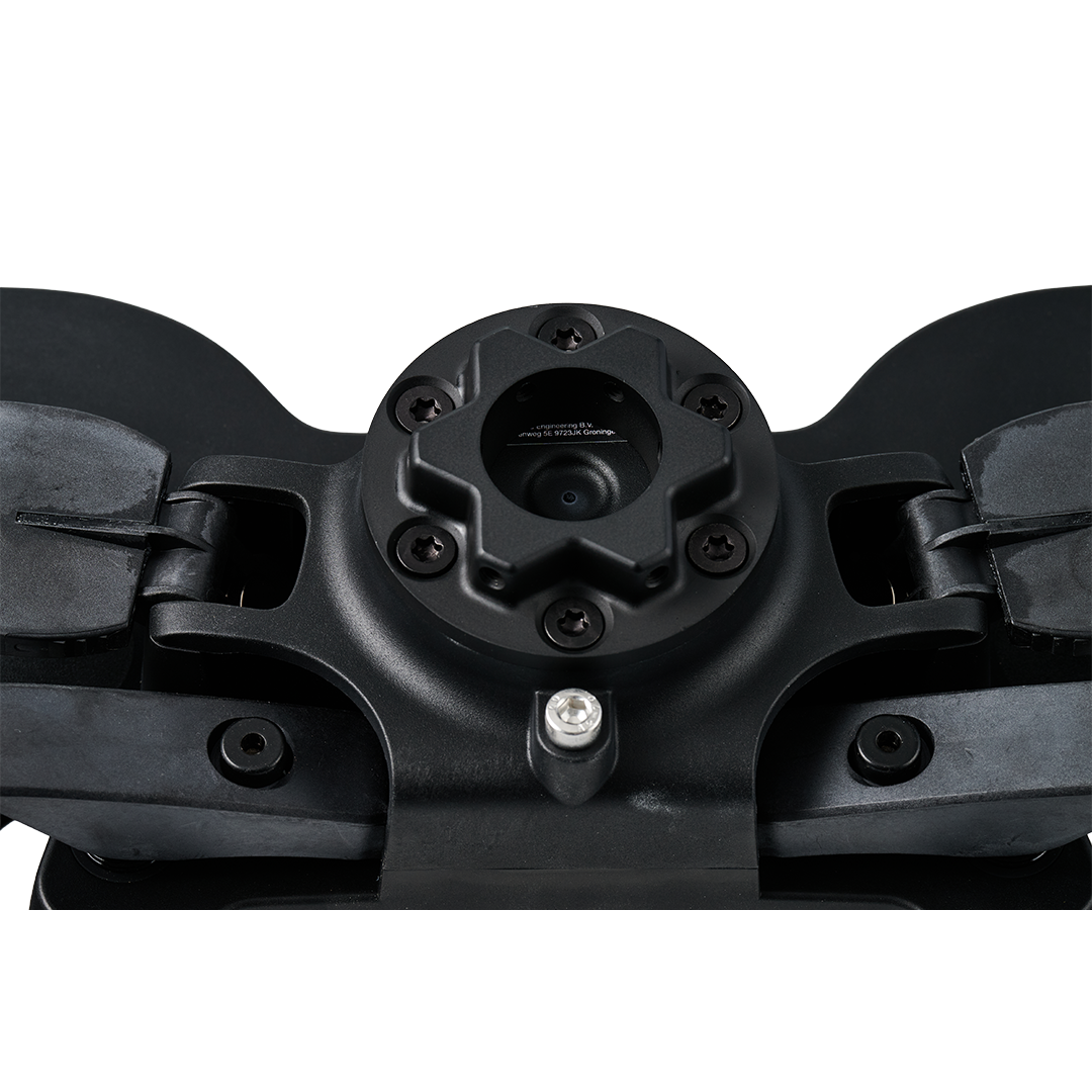 Close-up of a black mechanical component on a white background