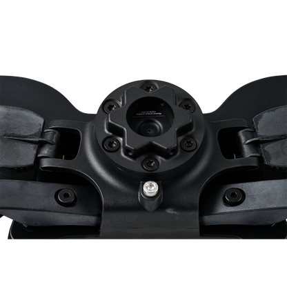Close-up of a black mechanical component on a white background
