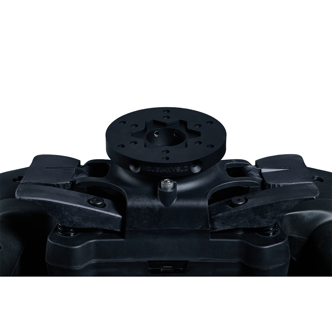 Close-up of a black mechanical component on a white background