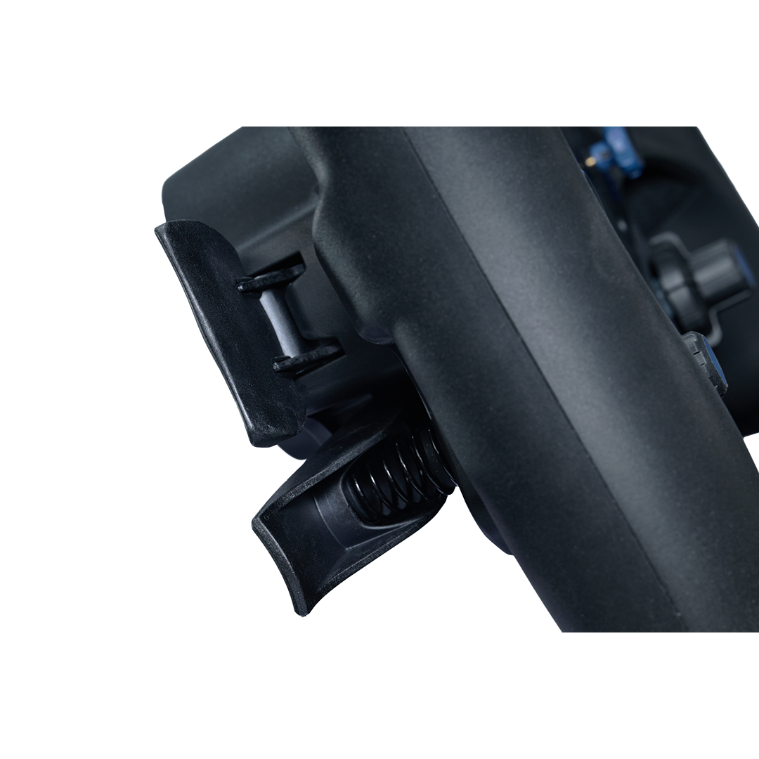 Close-up of a black metal component on a white background