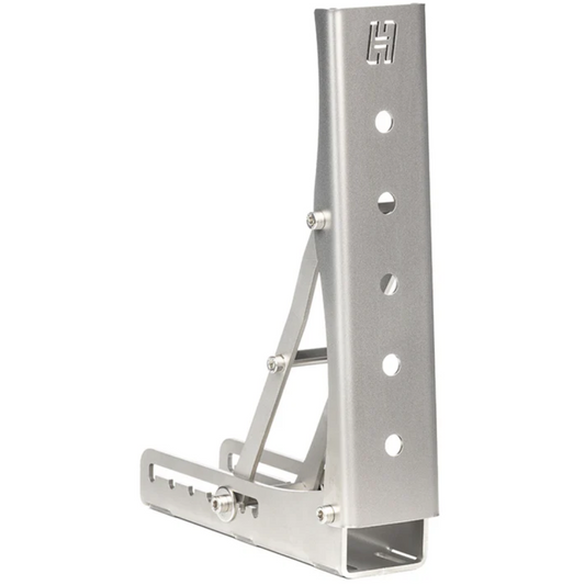 A silver stainless steel Heusinkveld Rest Pedal with multiple adjustment holes, designed for use with racing simulators.
