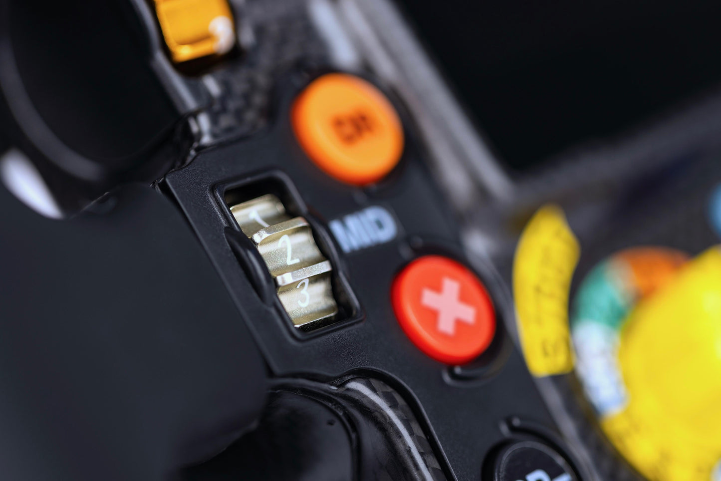 Close-up of a control panel with buttons and a switch.
