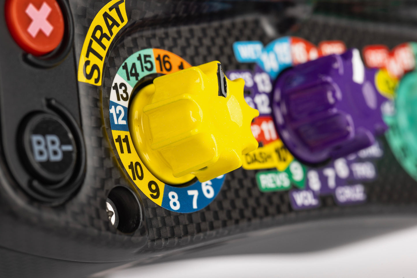 Close-up of a radio control panel with various knobs and buttons.