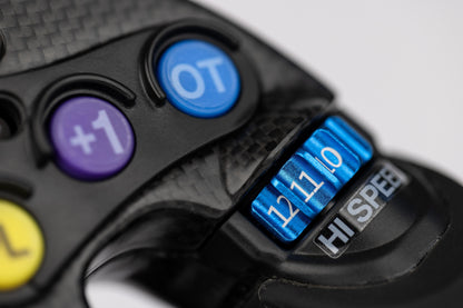Close-up of a control panel with buttons and display on a gray background