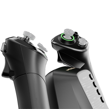 Close-up of a black and gray electronic device with control elements on a white background