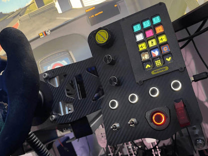 Control panel with buttons and joystick in a simulation setup