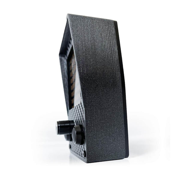 Black rectangular object with textured surface on a white background