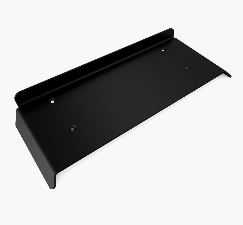 Black metal shelf on a white background