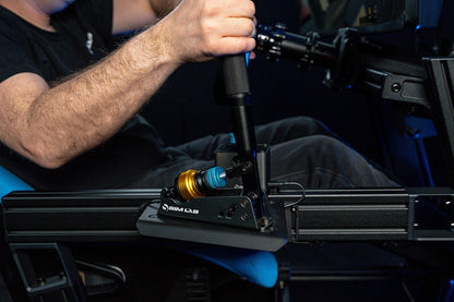 Person adjusting a rifle scope inside a vehicle with 'GAMM LAB' branding.