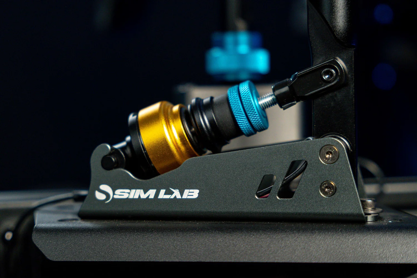 Close-up of a mechanical component with 'Sim Lab' branding on a dark background