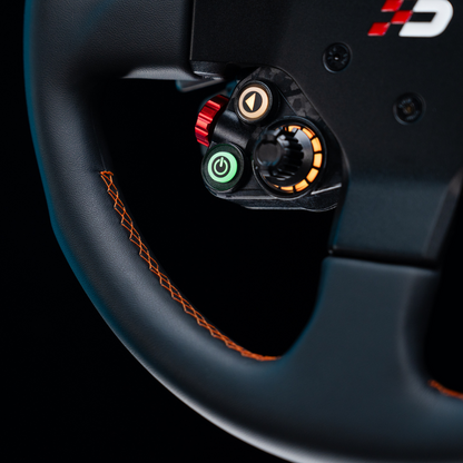 Close-up of a steering wheel with control buttons on a black background