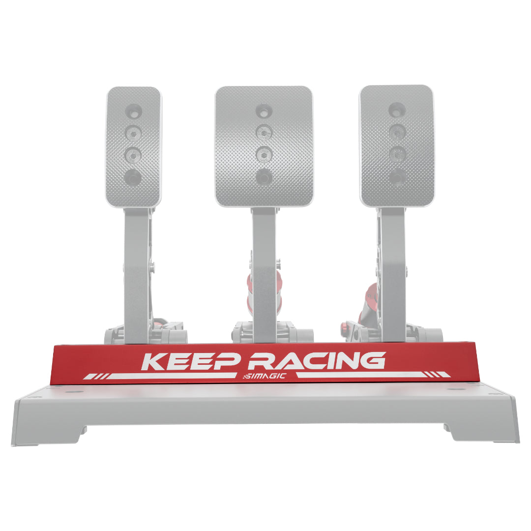 Simagic Heel Stop P1000 Pedals, featuring three inverted silver pedals mounted on a grey base with a red 'KEEP RACING' label.