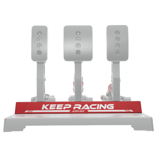 Simagic Heel Stop P1000 Pedals, featuring three inverted silver pedals mounted on a grey base with a red 'KEEP RACING' label.