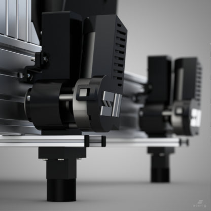 Close-up of a mechanical device with black and silver components on a gray background