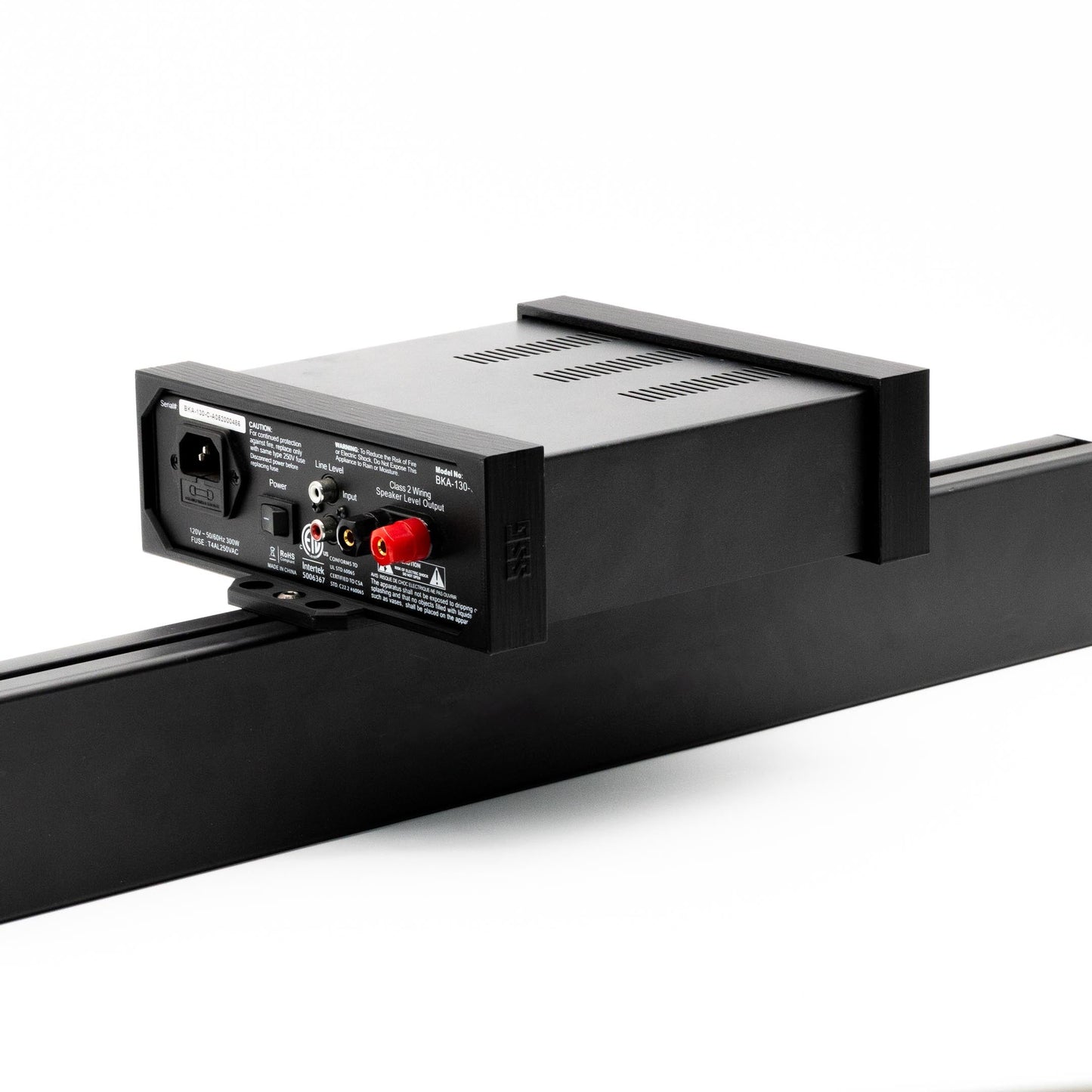Black electronic device with connectors on a white background
