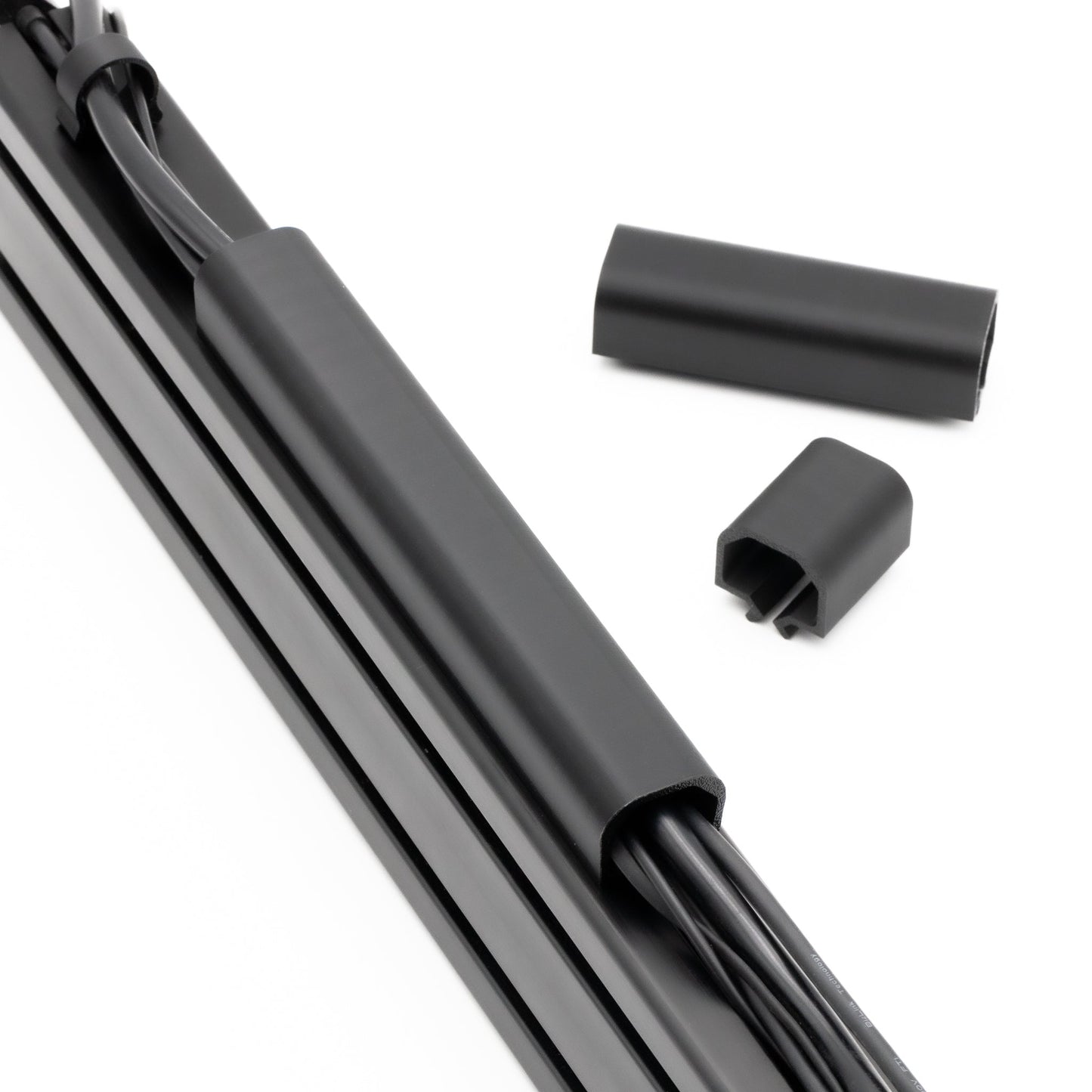 Car wiper blade with two black rubber tips on a white background
