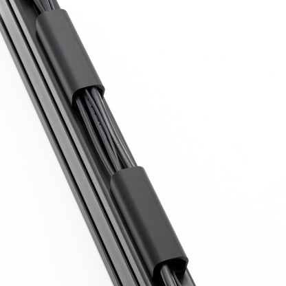 Close-up of a car windshield wiper blade on a white background
