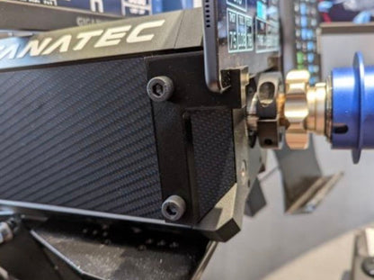 Close-up of a machine tool with 'ANATEC' branding on a workshop background