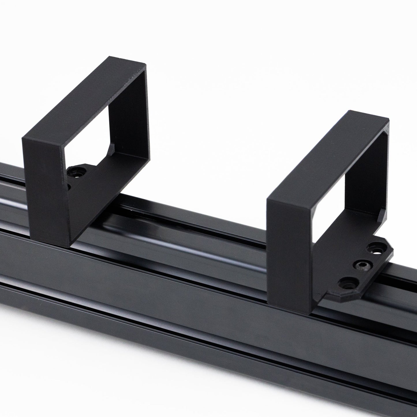 Black metal bracket on a white background
