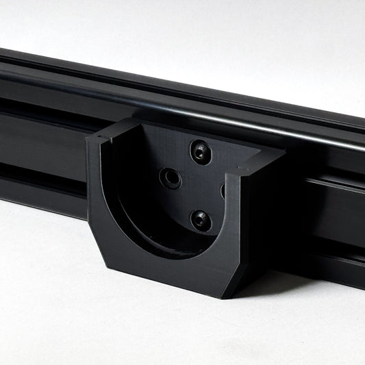 Close-up of a black metal roof rack on a white background