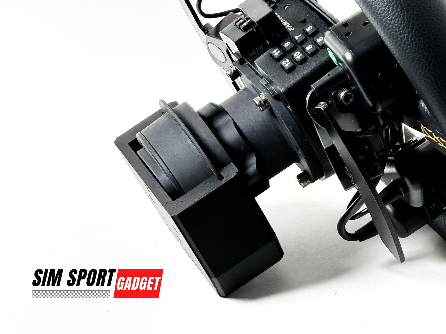 Close-up of a black sports car part with 'Sim Sport Gadget' branding on a white background