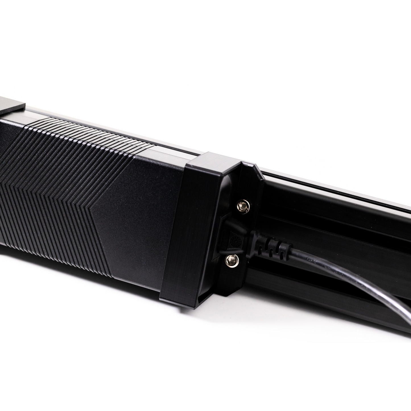 Close-up of a black electronic device on a white background