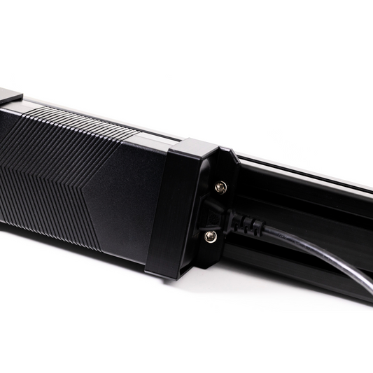 Close-up of a black electronic device on a white background