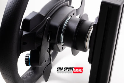 Close-up of a black steering wheel and monitor setup with 'Sim Sport Gadget' branding.