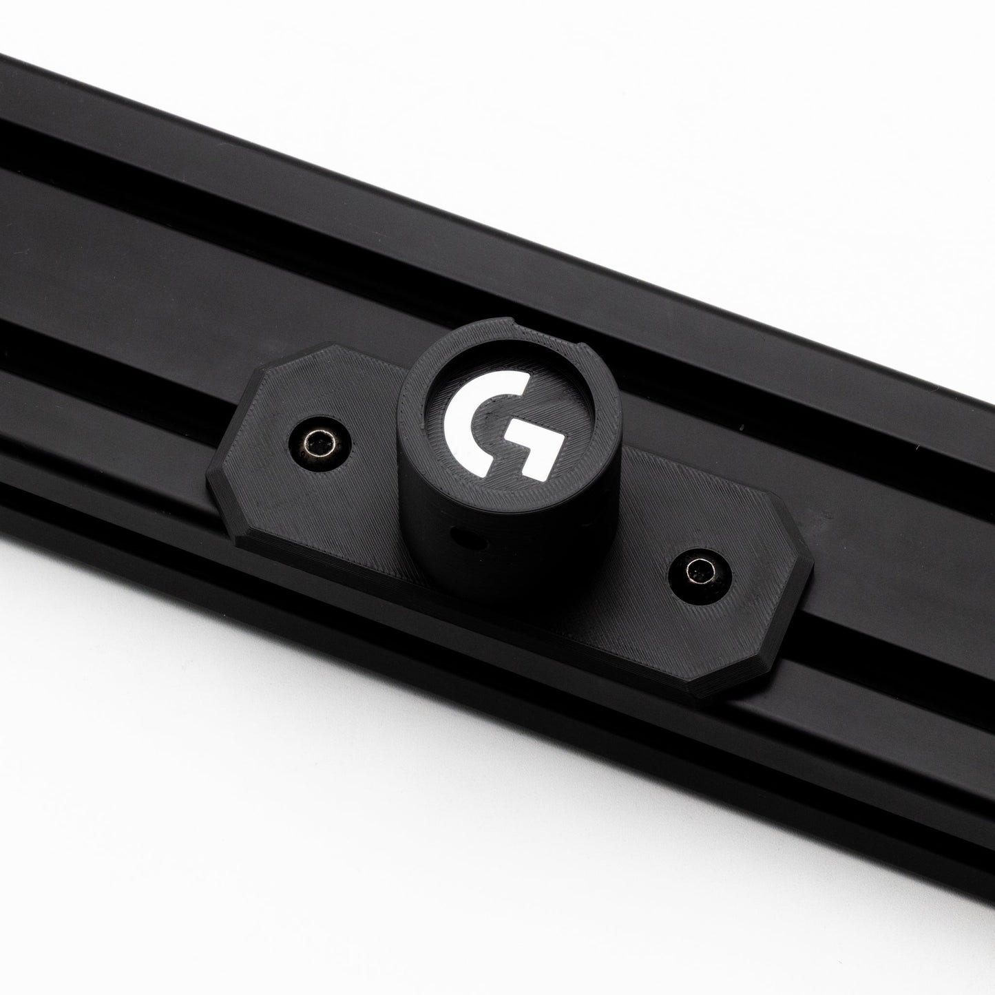 Black gaming mouse pad with a prominent 'G' logo on a white background