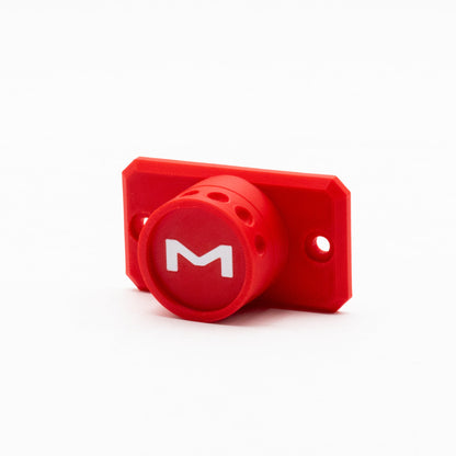 Red device with a white 'M' logo on a white background