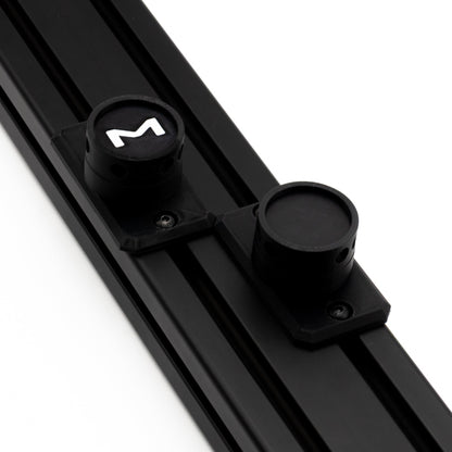 Black metal rod with cylindrical components and a logo on a white background