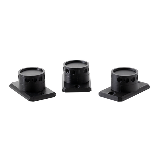 Three black camera lens hoods on a white background