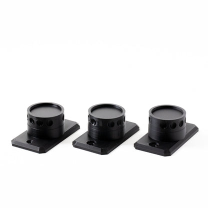 Three black camera lens hoods on white background