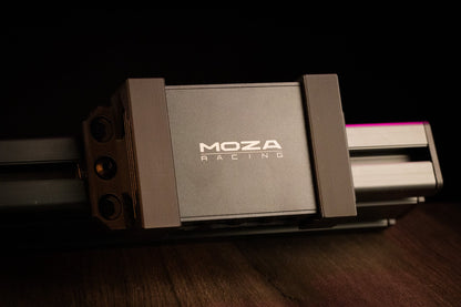 MOZA Racing camera mount on a wooden surface with a dark background
