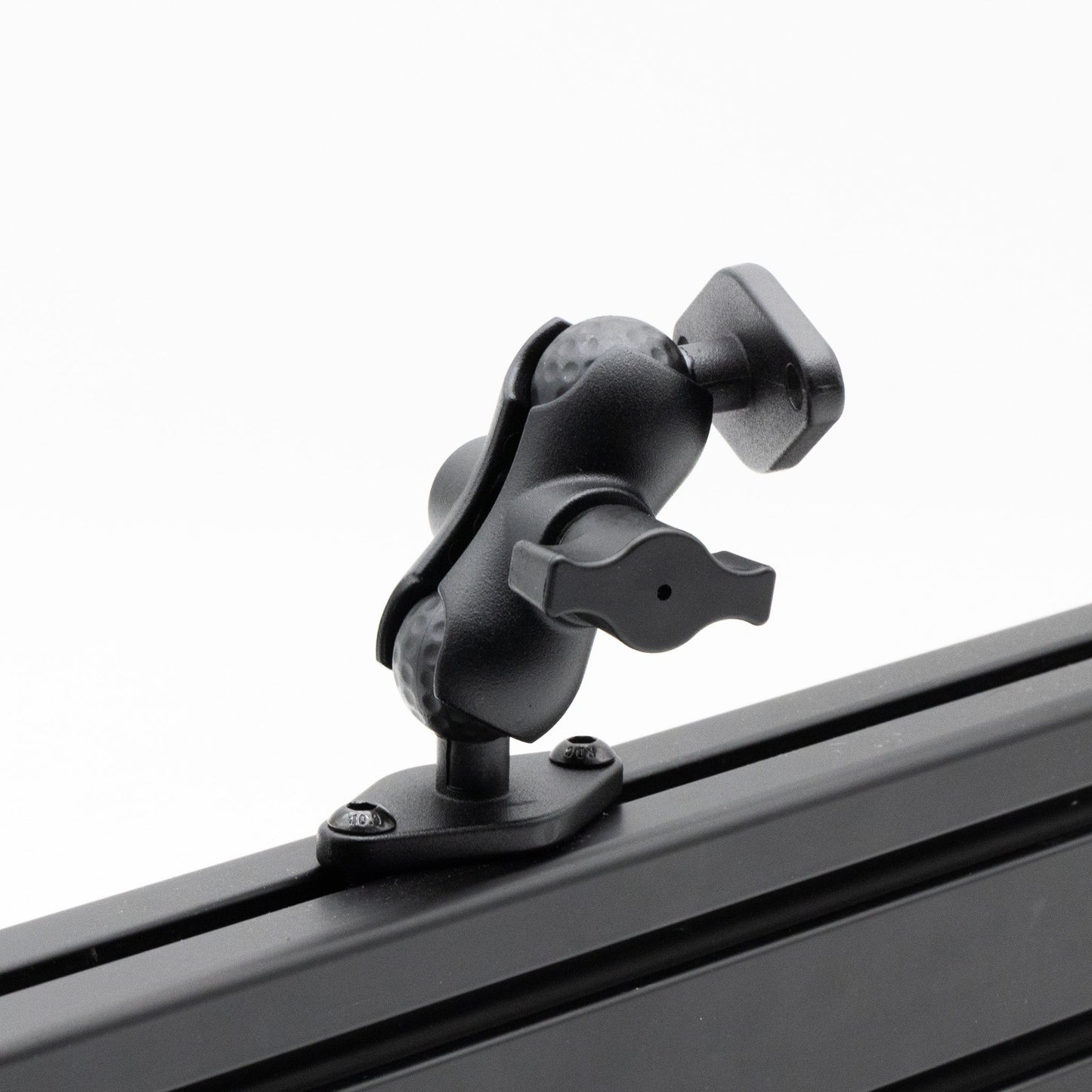 Black car roof rack mount on a white background