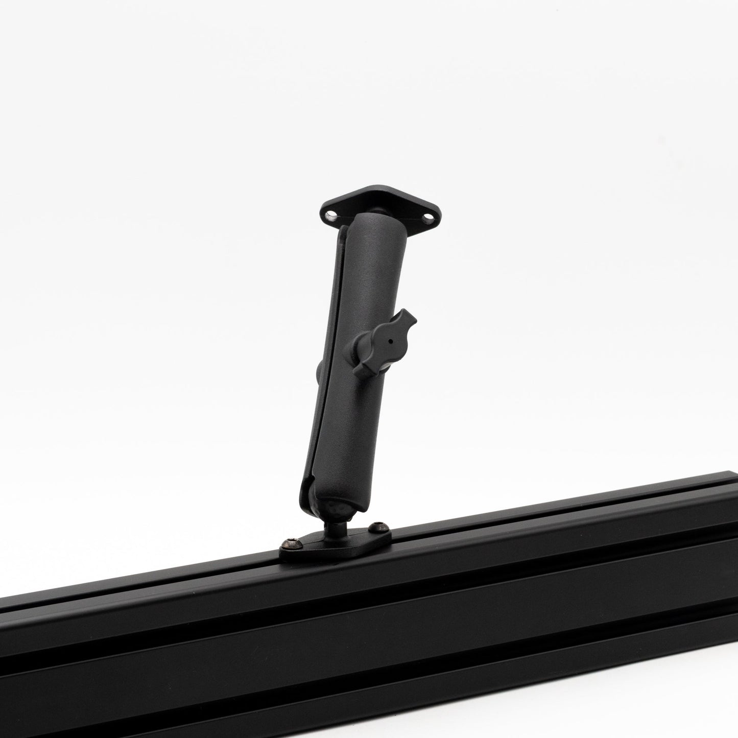 Black roof rack bar with mounting bracket on a white background